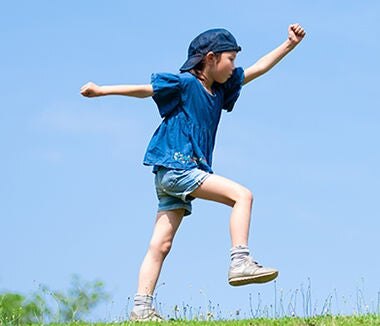 kid playing in the nature